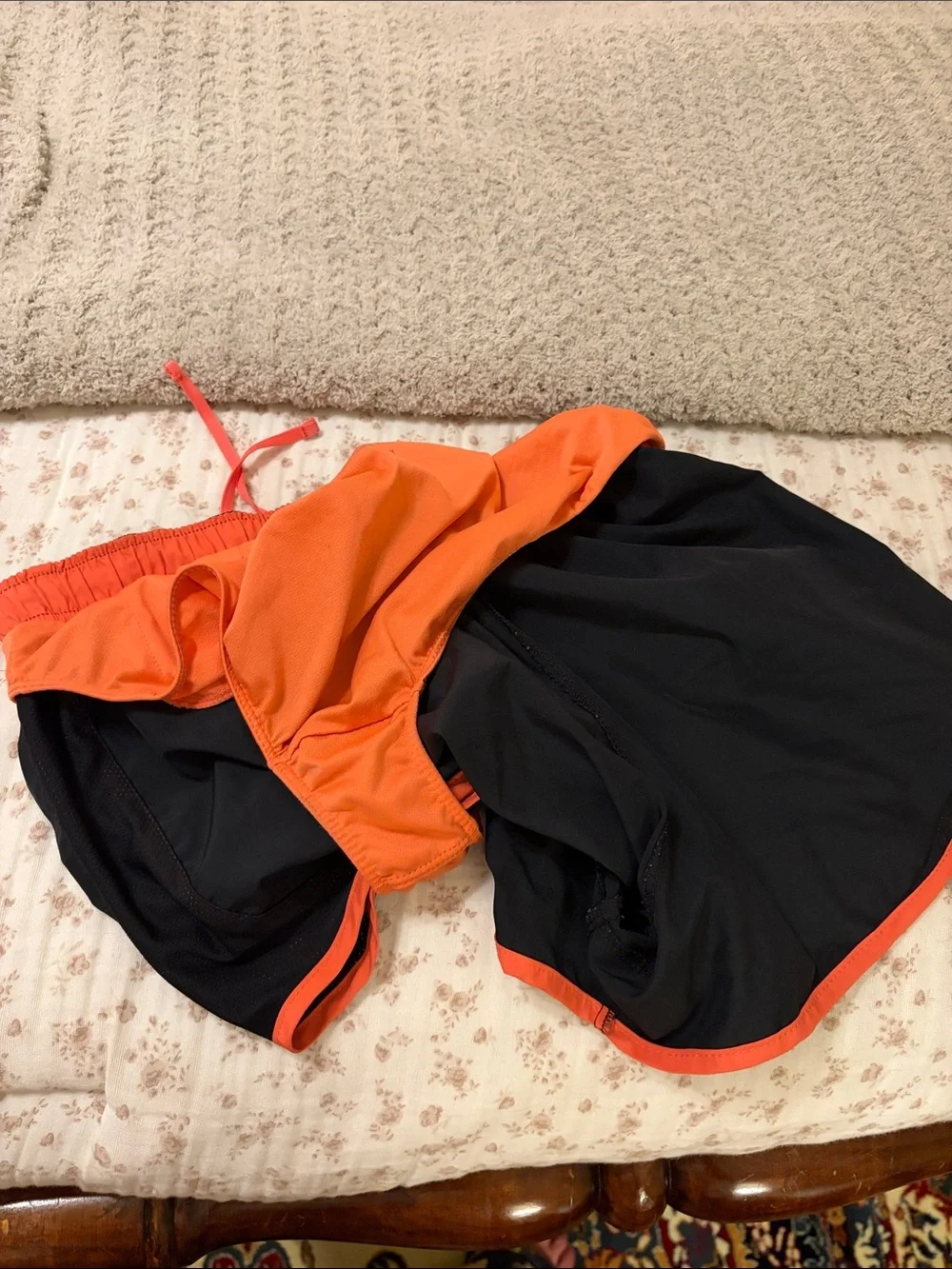 Nike Women’s Black Running Shorts with Orange Trim